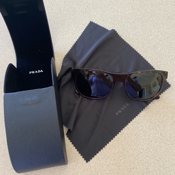 Prada sunglasses. Only worn a couple of times. - Picture 1 of 4